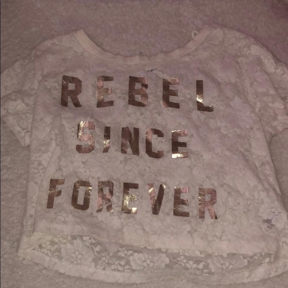 White lace top with gold lettering